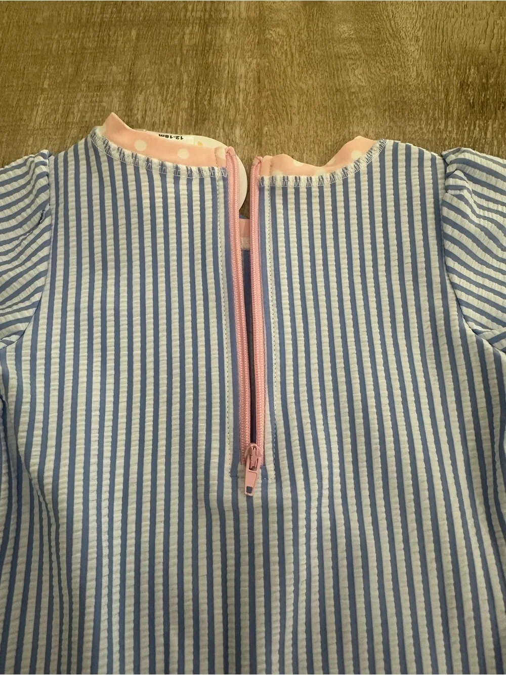 RuffleButts Blue Seersucker Rash Guard One Piece | 12–18M | UPF 50+